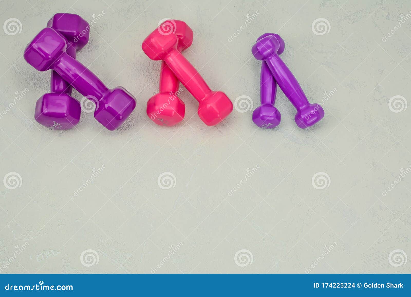 set of three dumbbells