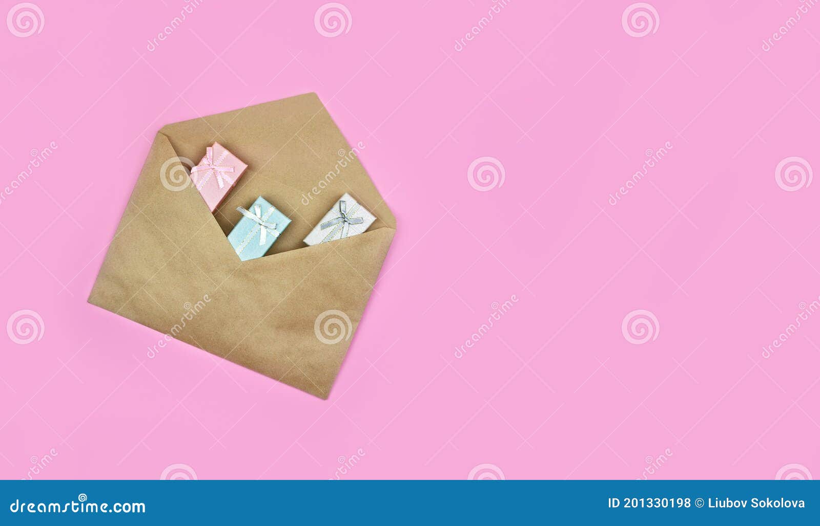 Minimalistic Christmas Ornament. Gift Boxes in a Brown Craft Mail