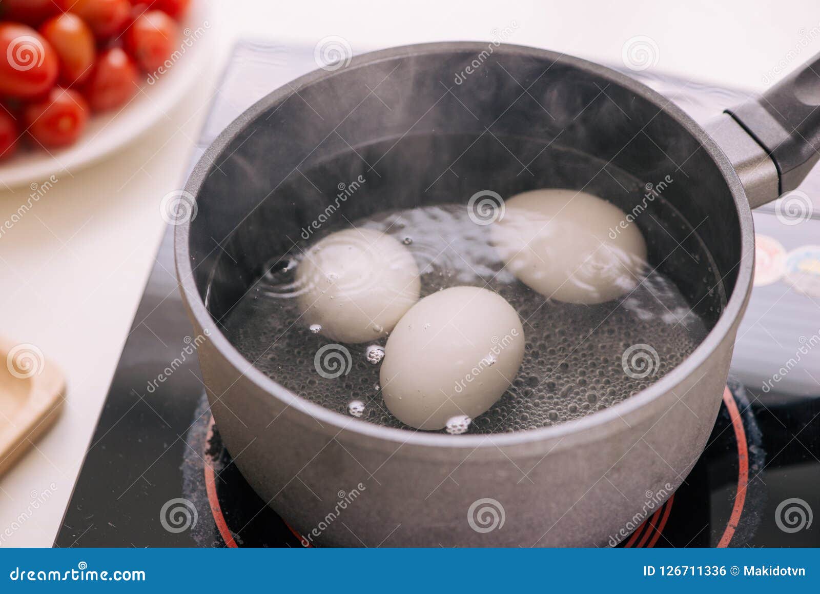 Three Eggs Boiling in Pan of Water Stock Photo Image of food, hard 126711336