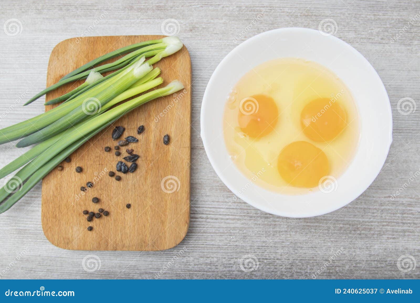 Three Eggs Broken, Green Onions, Eggs in a Package, Black Peppercorns