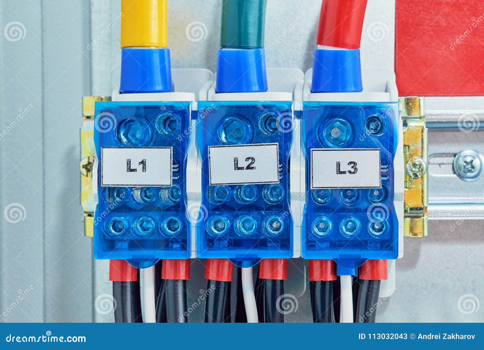 Three Electrical Cables or Wires are Connected To the Distribution