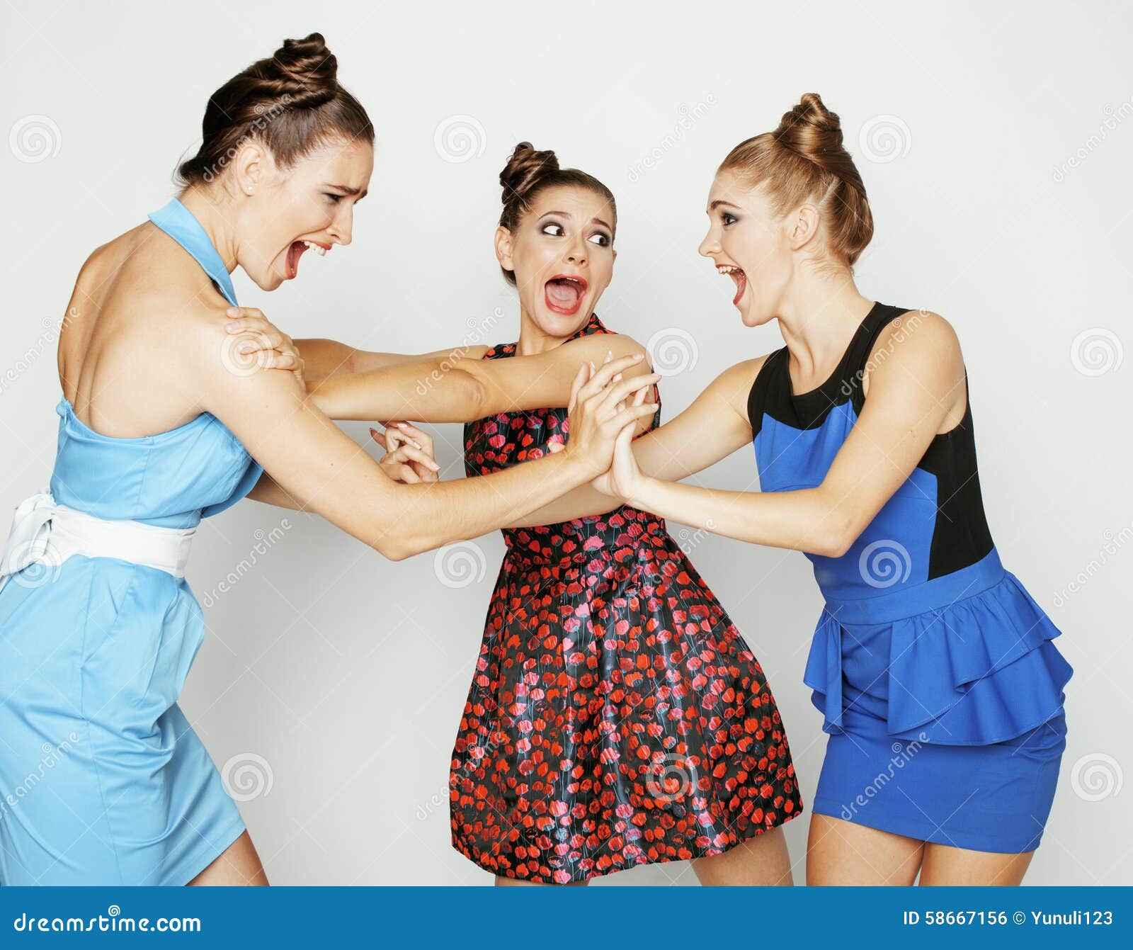 Three Elegant Fashion Woman Fighting on ...