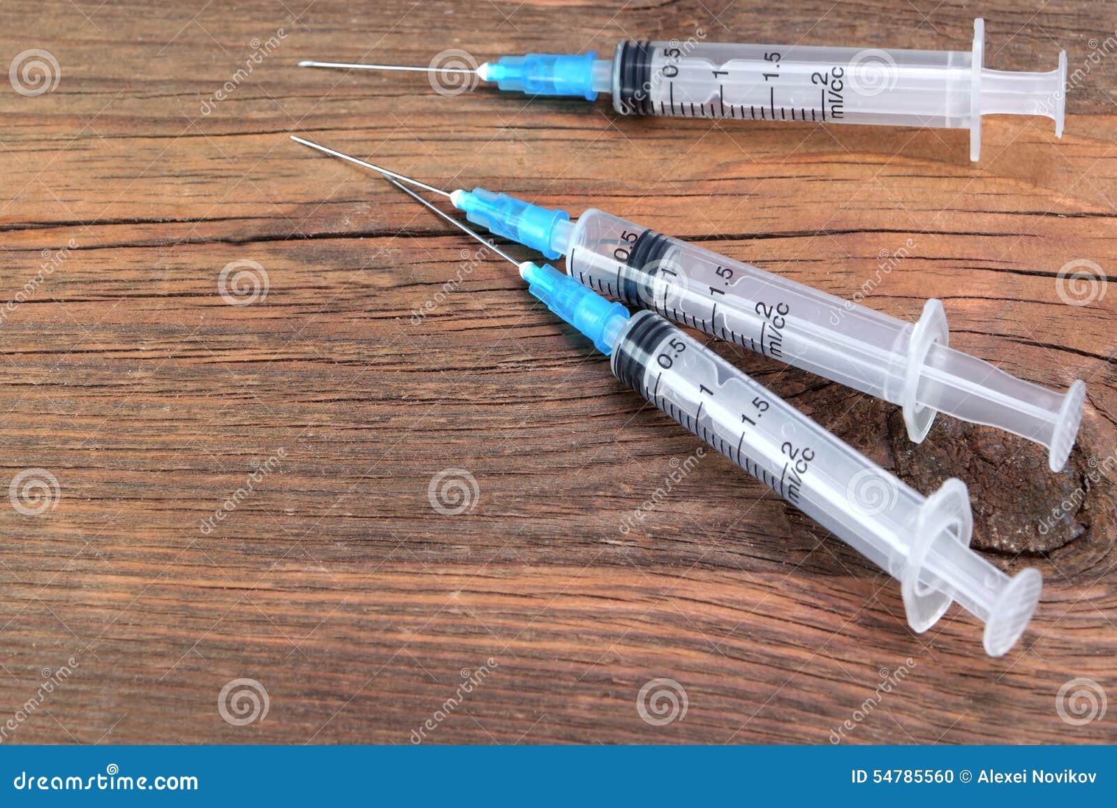 Three Empty Medical Syringes on Rough Wood Board Stock Photo Image of selection, fatal 54785560