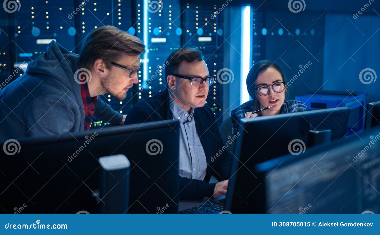 Three it Engineers / Programmers Talking about Work, Using Computers ...
