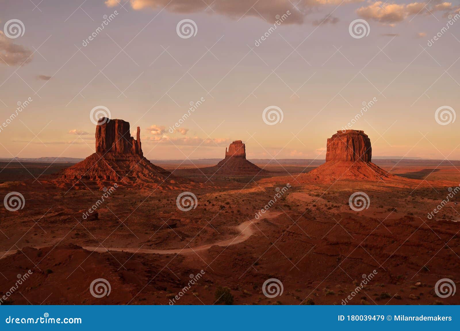 The Three Famous Rocks Of Monument Valley Standing Tall In The Vast Landscape During Sunset On A Summer Day Stock Image Image Of Wild Stone