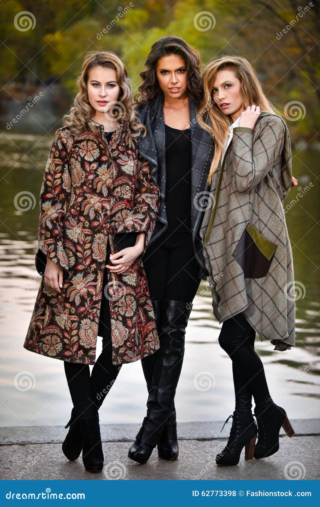 three-fashion-models-posing-central-park-fall-fashion-photo-shoot-new-york-location-62773398.jpg