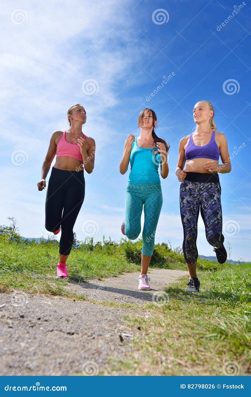 Three Female Joggers Running Together Outdoors Stock Photo Image of
