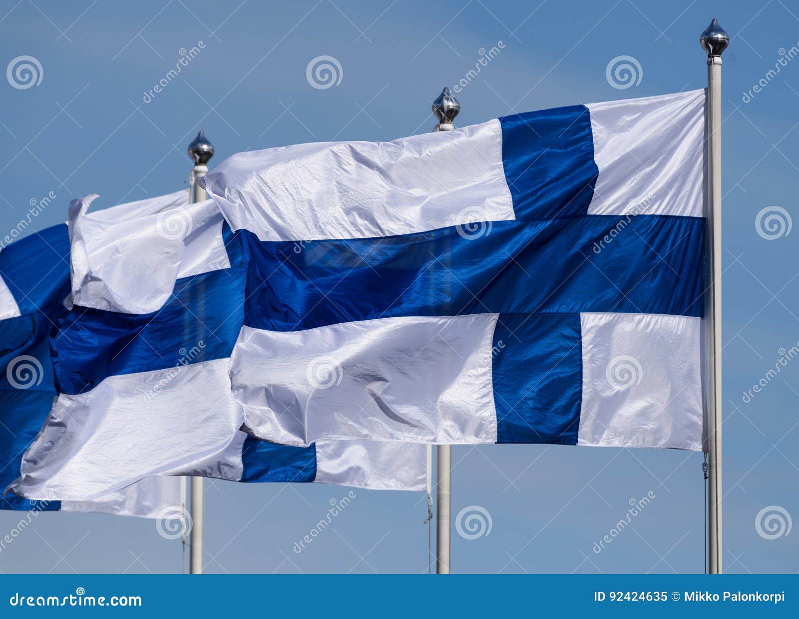 Three Finnish flags flying stock image. Image of finnish 92424635