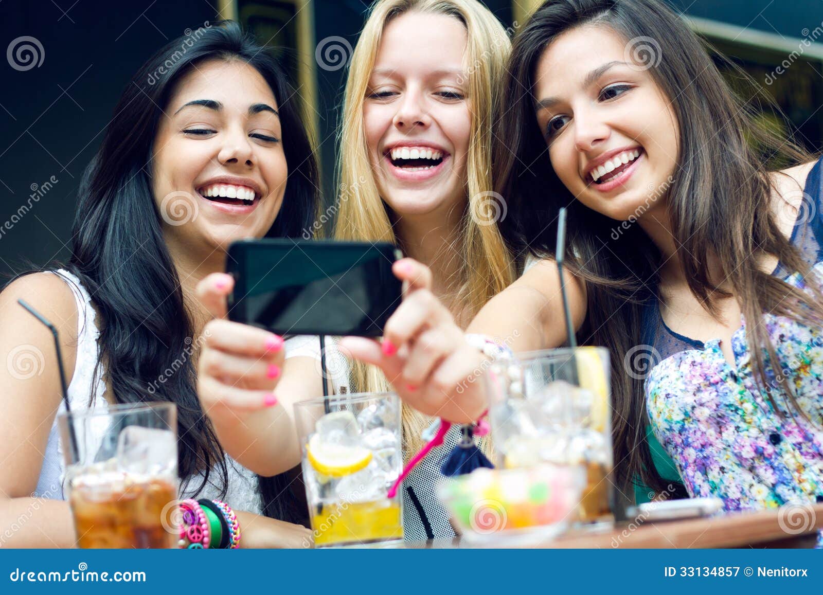 Three Friends Taking Photos with a Smartphone Stock Image - Image of ...