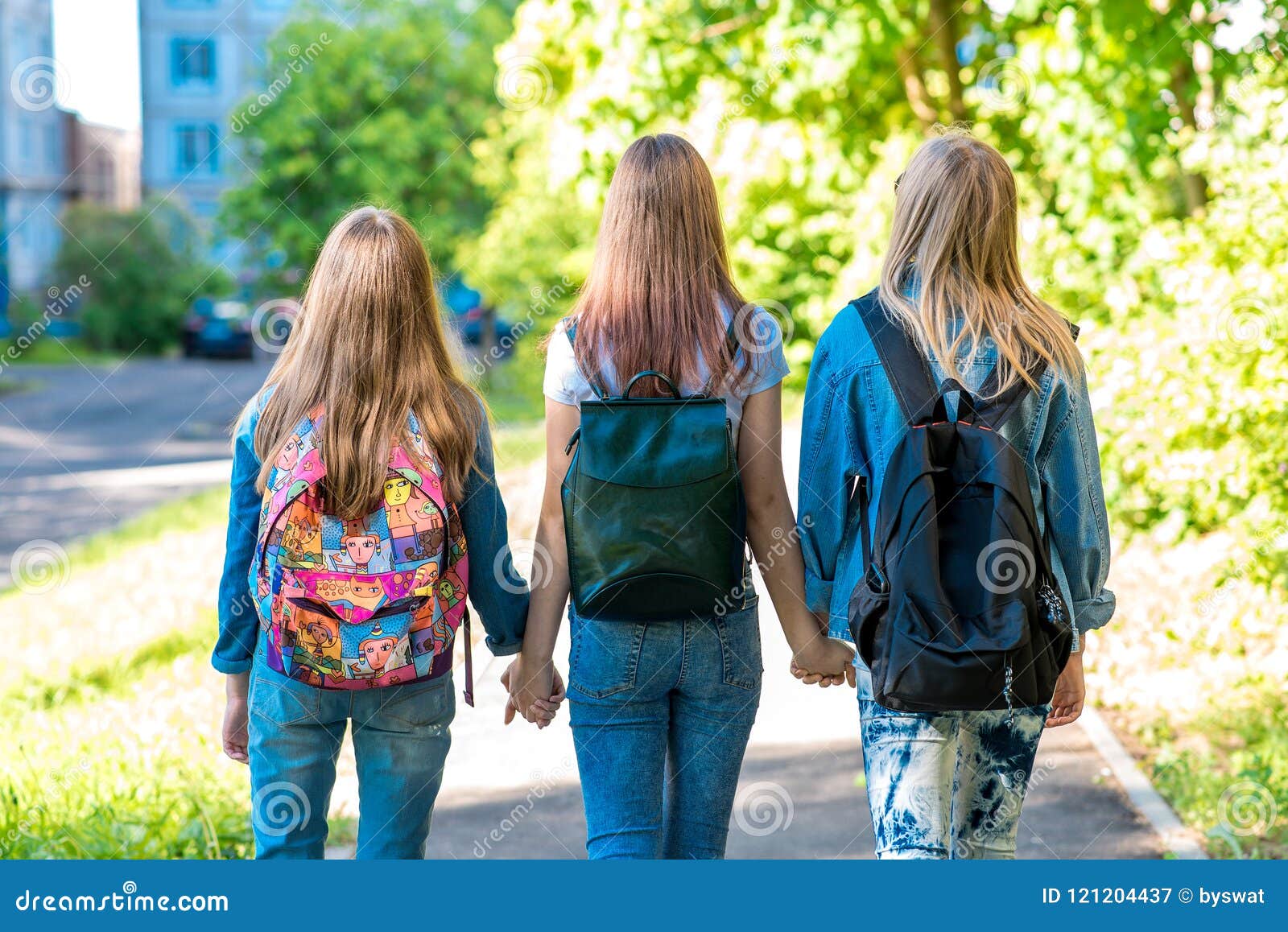 Three Girl Schoolgirl Girlfriends. they Hold Each Other`s Hands ...
