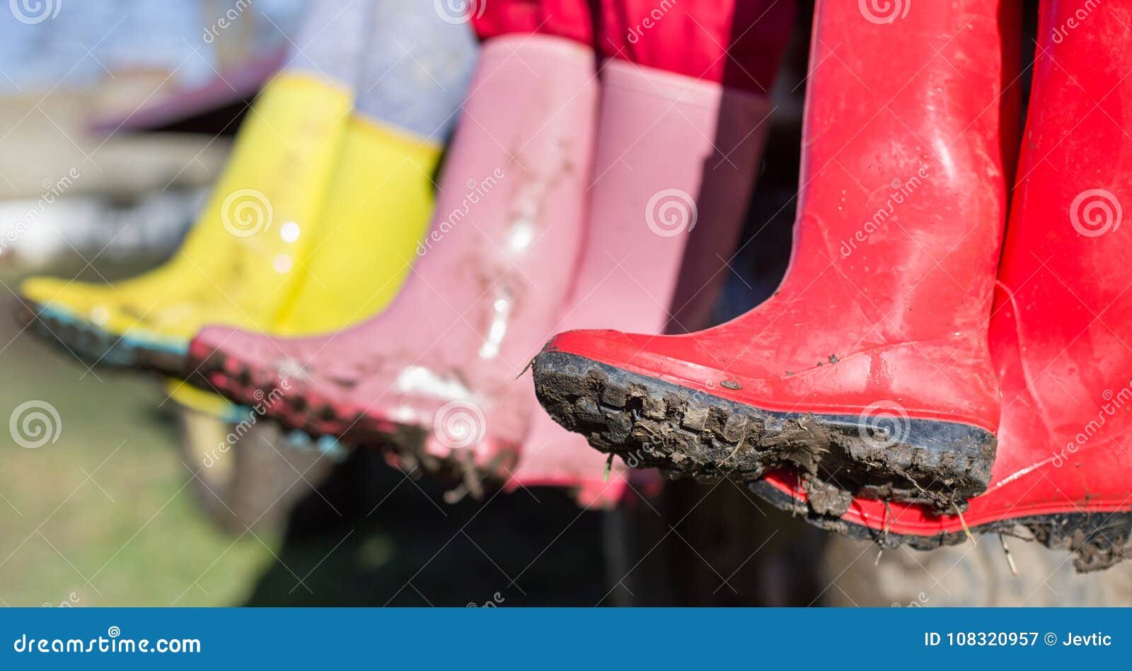 Three Girls in Dirty Gumboots Stock Image - Image of girl, dirty: 108320957