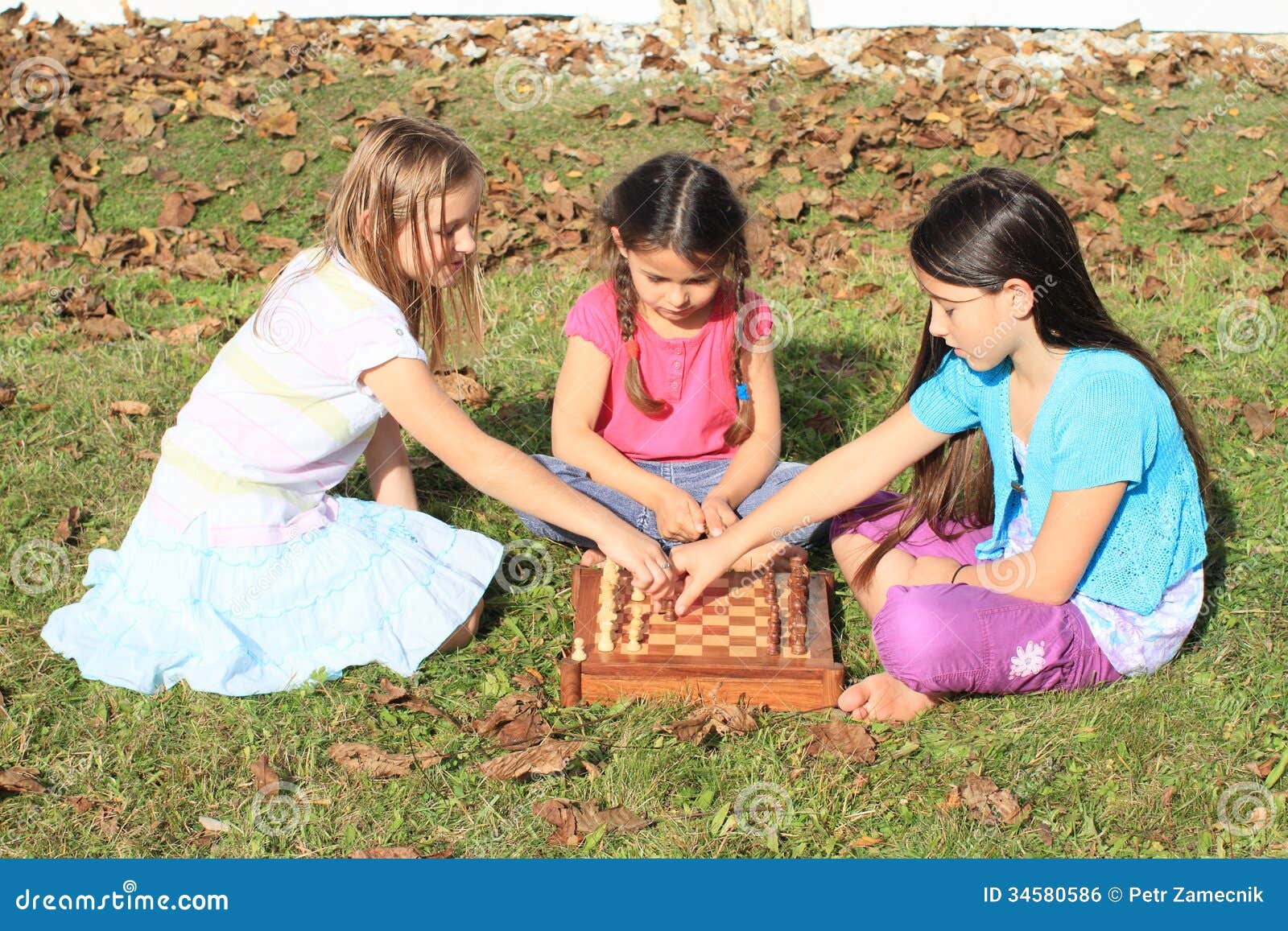 Three girls playing a game
