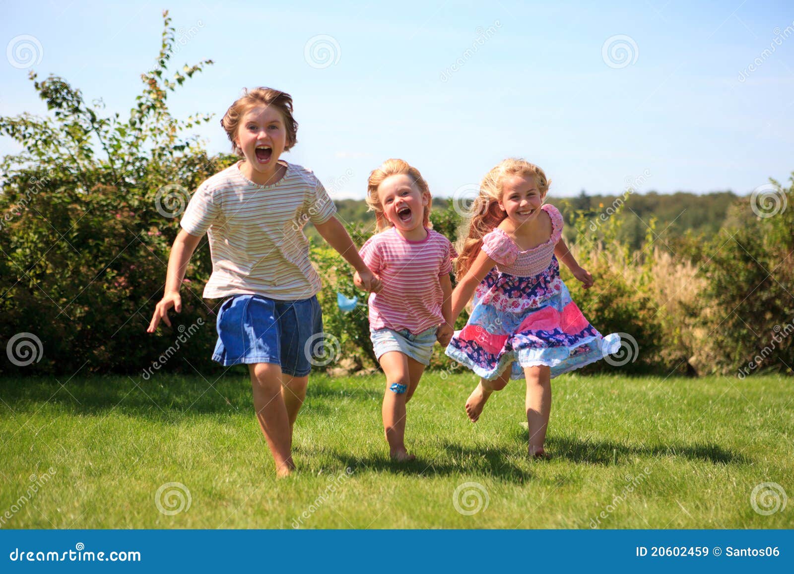 Three Girls Running Outdoor Laughing Stock Image Image of grass
