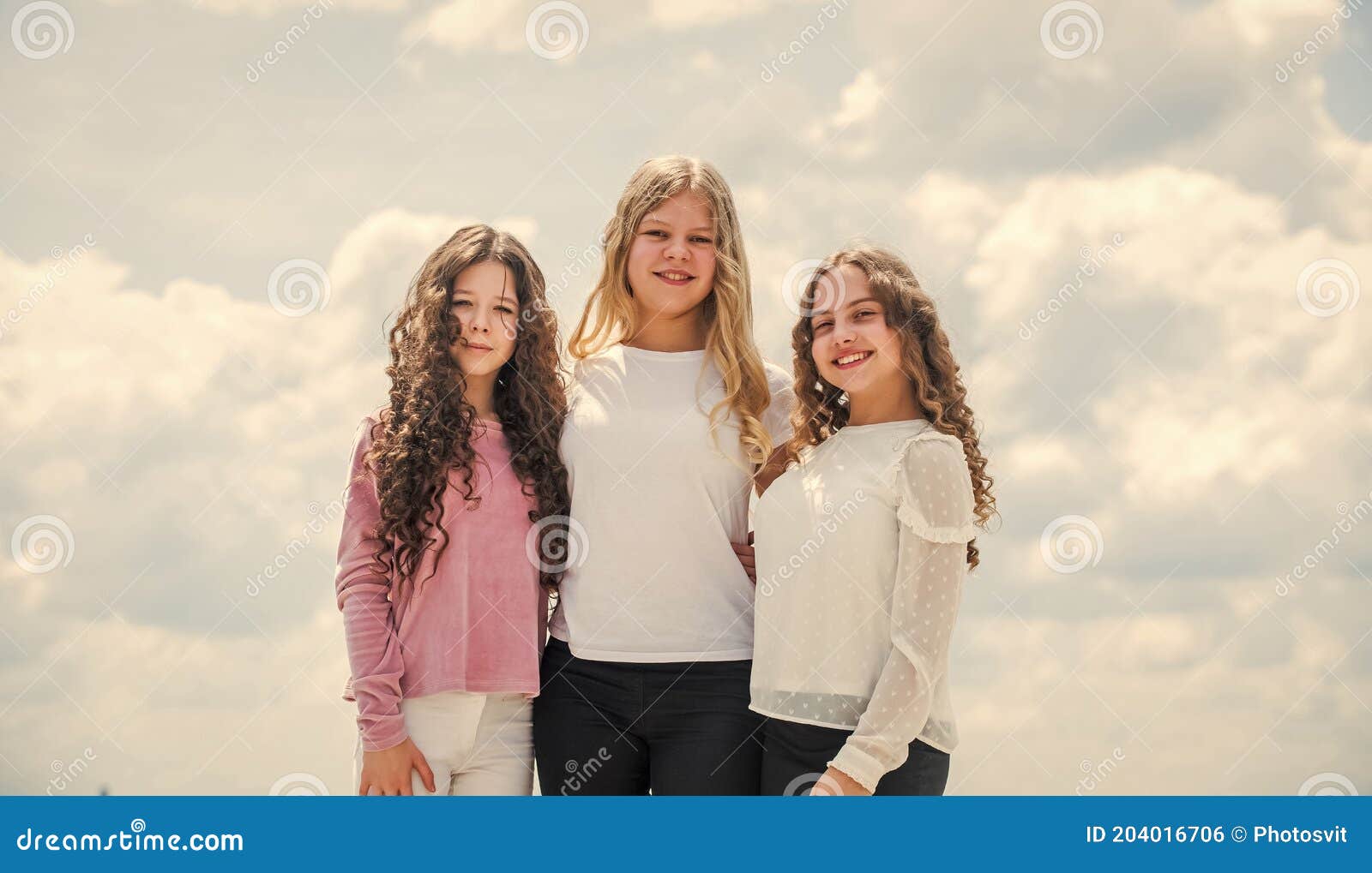 Three Girls on Sky Background. Concept of Female Friendship ...