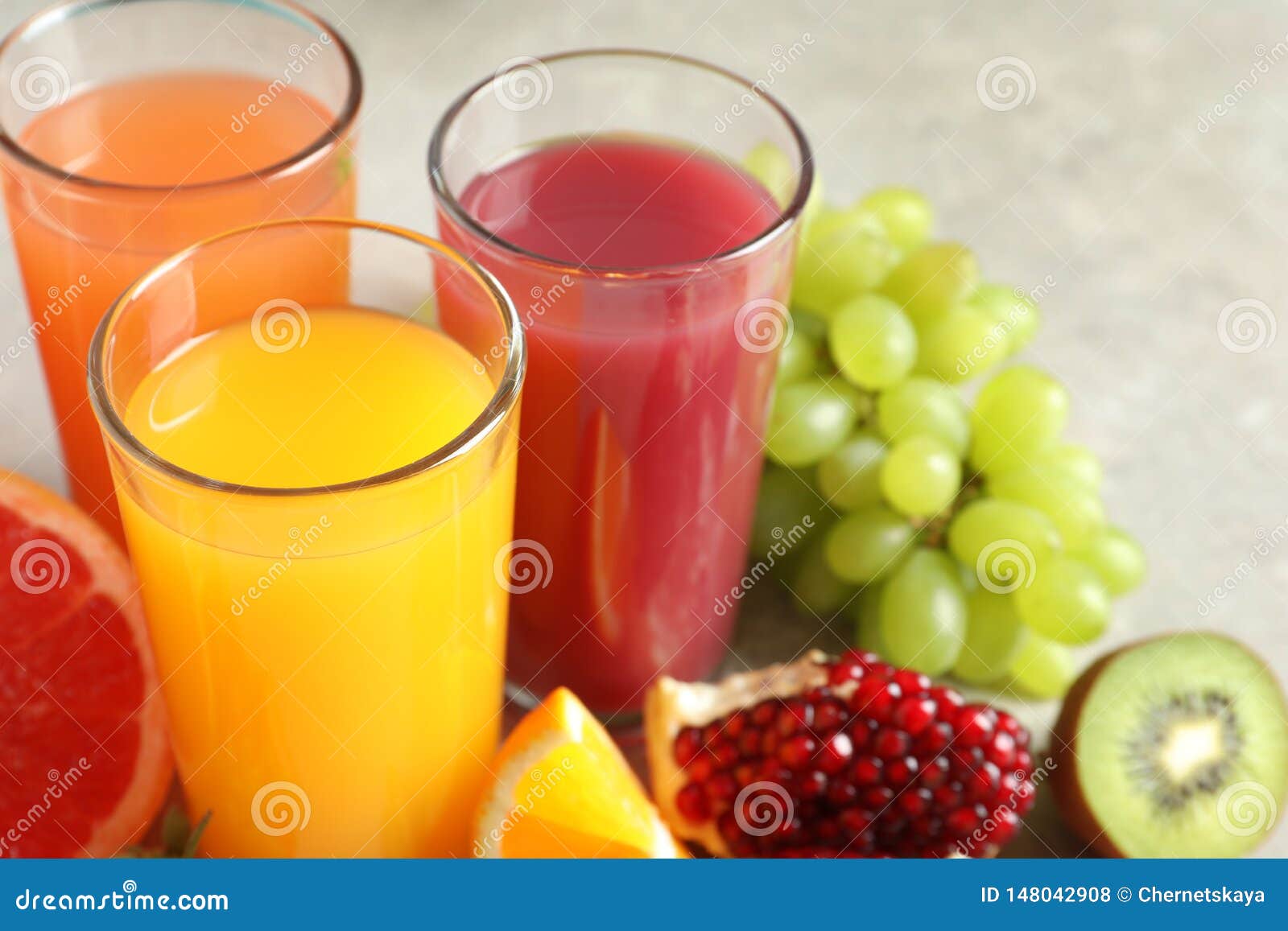 https://thumbs.dreamstime.com/z/three-glasses-different-juices-fresh-fruits-table-148042908.jpg