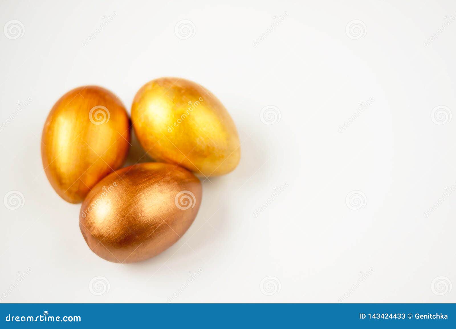 Three Gold and Bronze Eggs on a White Background Stock Image Image of making, design 143424433
