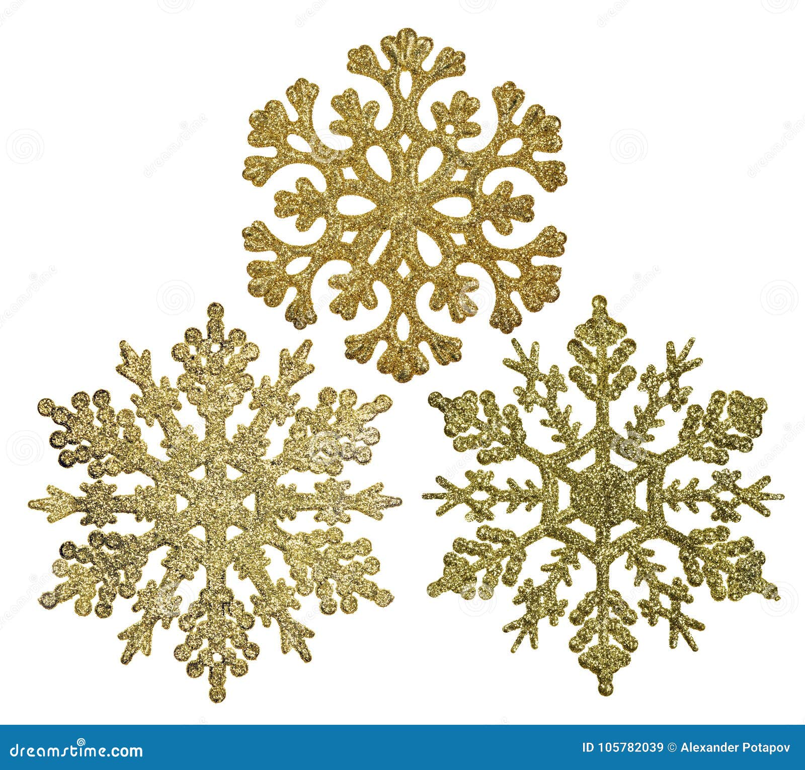 Three Gold Snowflake Shape Decorations Isolated on White Stock Image