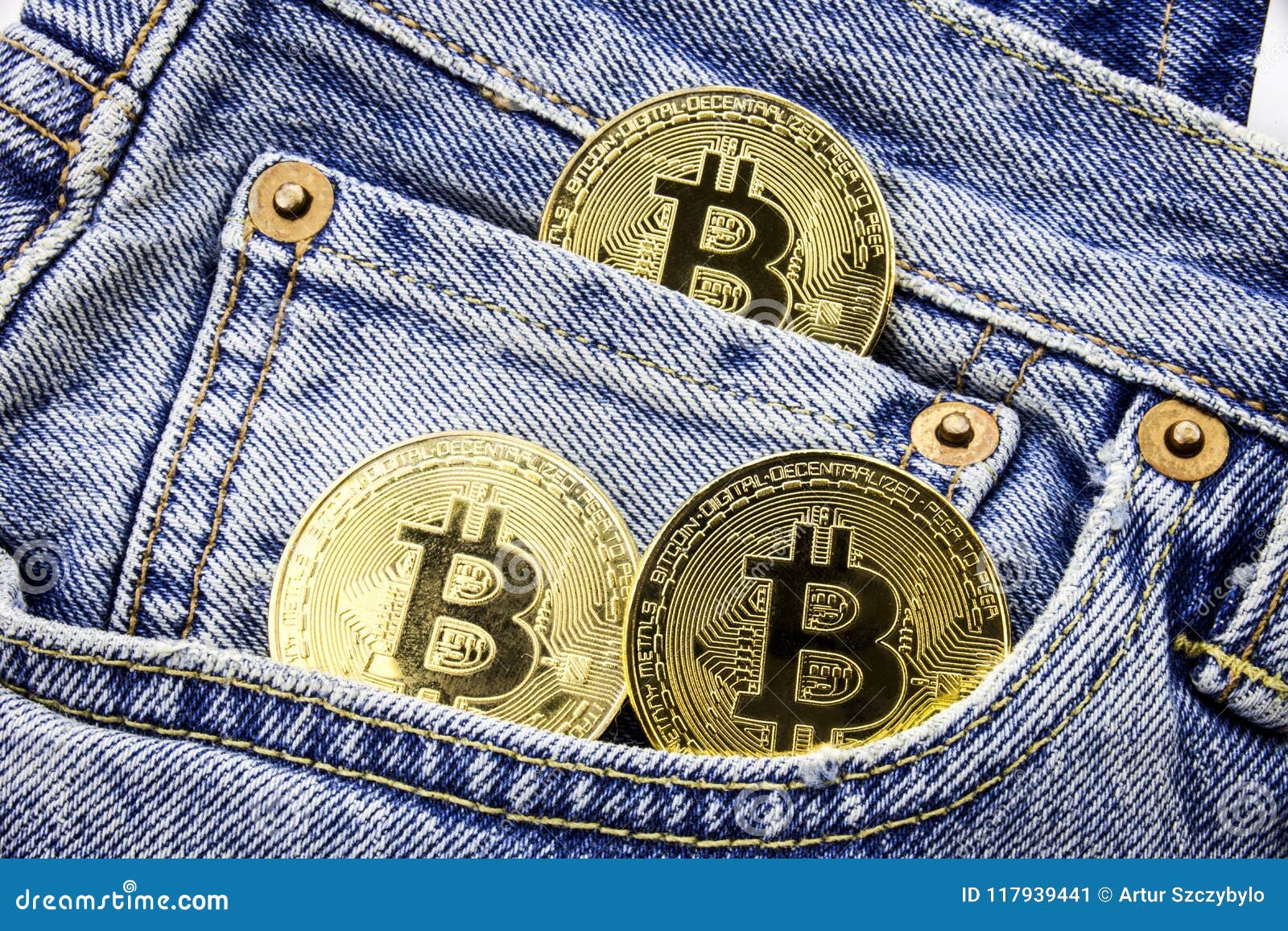 Three Golden Bitcoin Coins On The Pockets Of The Jeans Concept Of - 