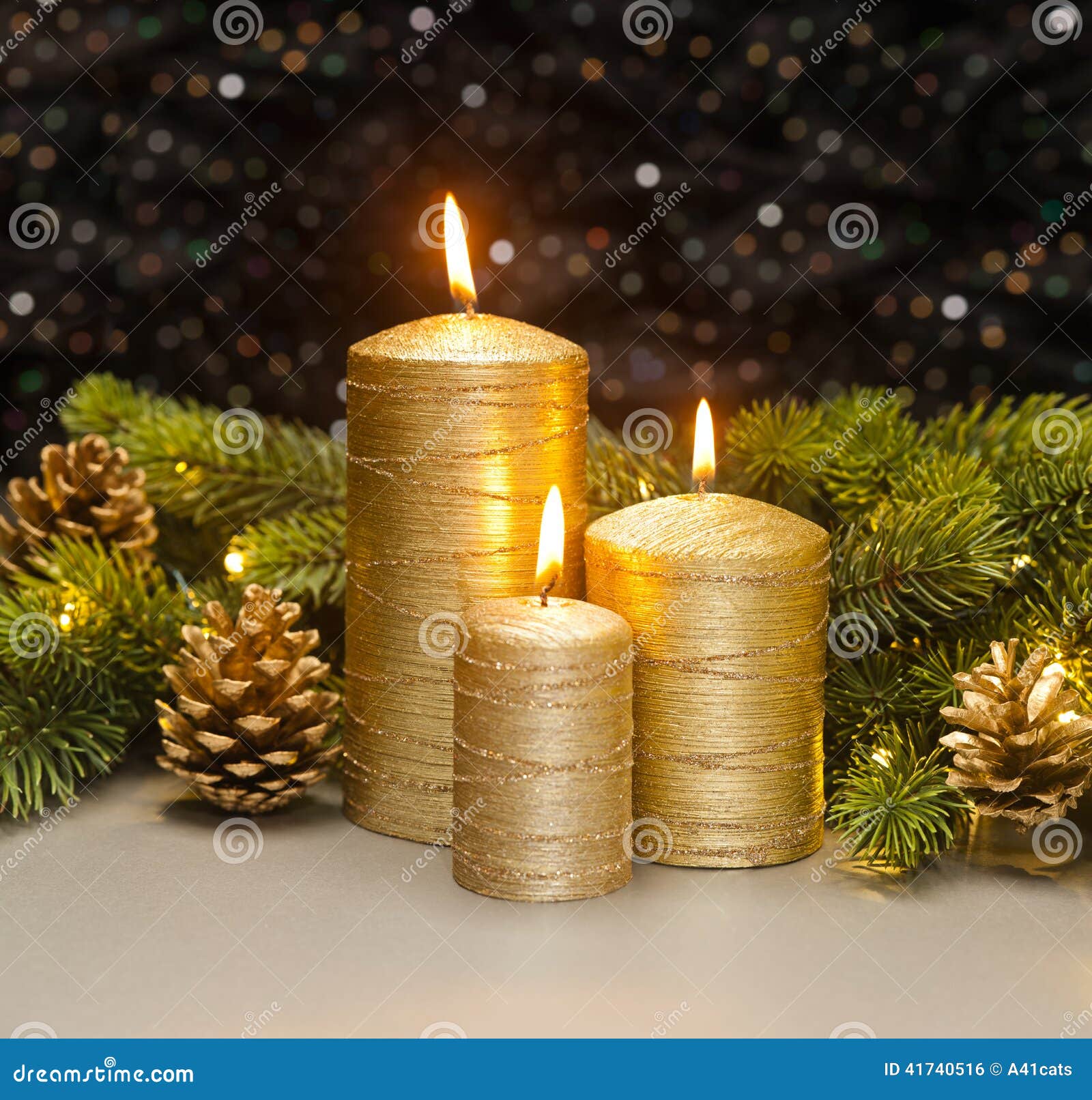 Three golden Candles stock photo. Image of christmas 41740516