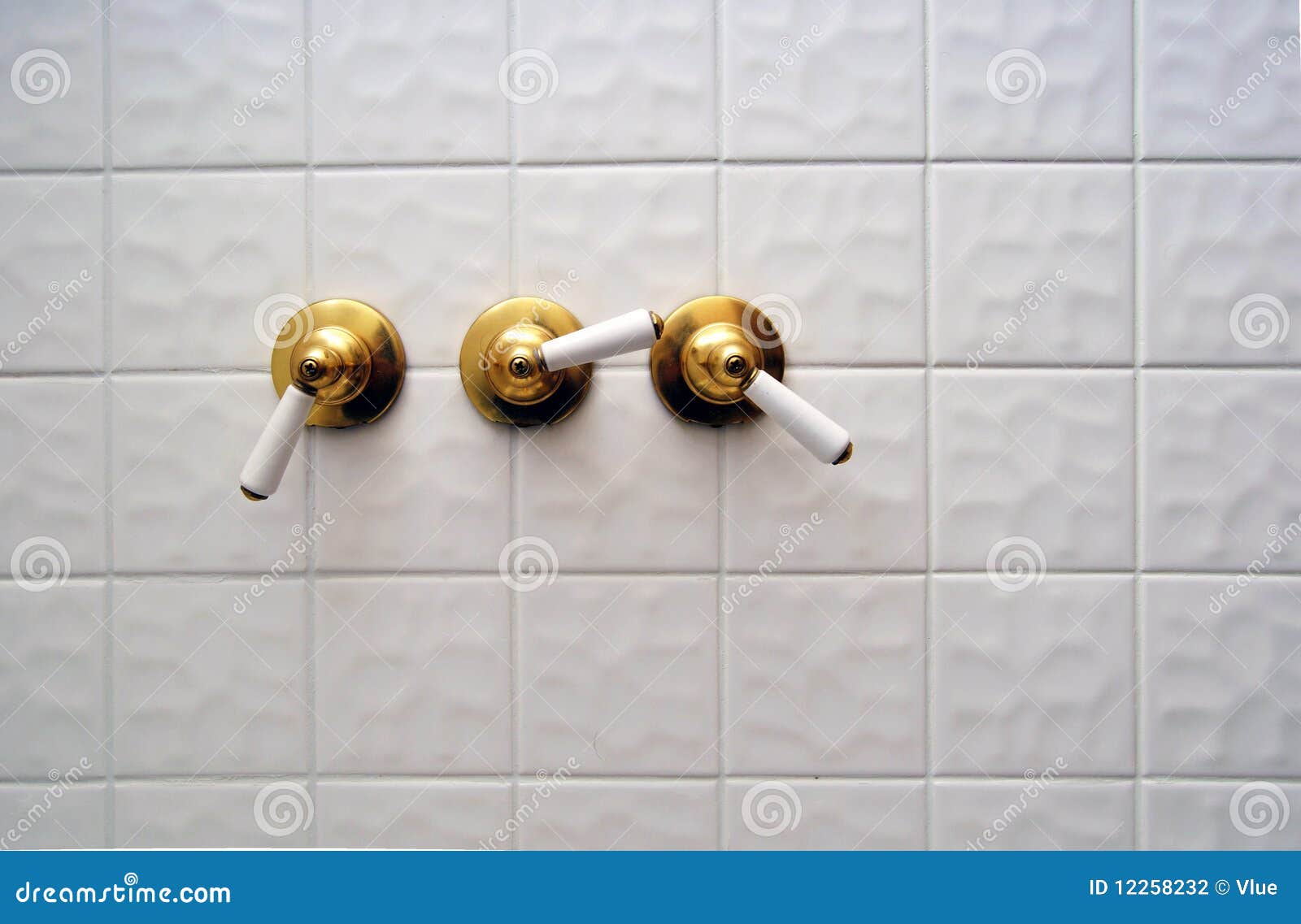 Three Golden Shower Valve Handles Stock Photo Image of bathtub