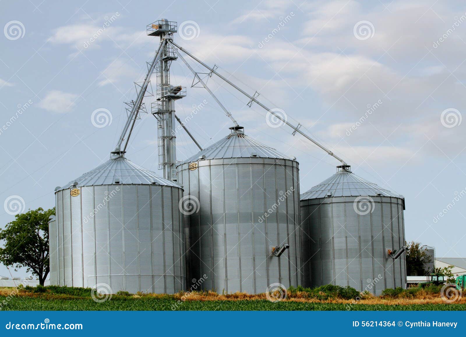 Three grain elevators editorial stock image. Image of farming 56214364