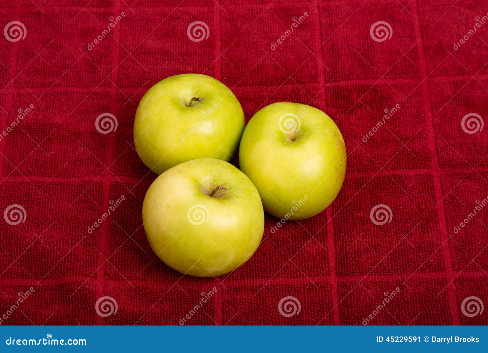 Three Granny Smith Apples on Red Towel Stock Image Image of ripe