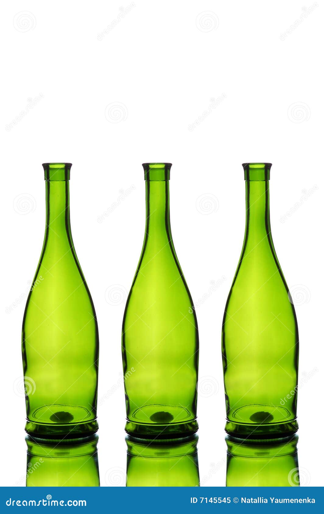 Three green wine bottles stock image. Image of bright 7145545