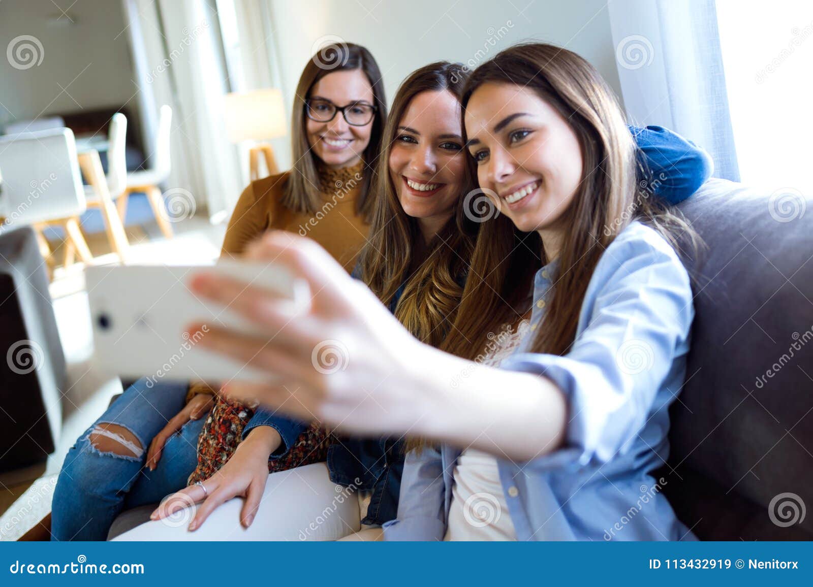 Three Happy Beautiful Women Taking a Selfie and Enjoying Time Together ...