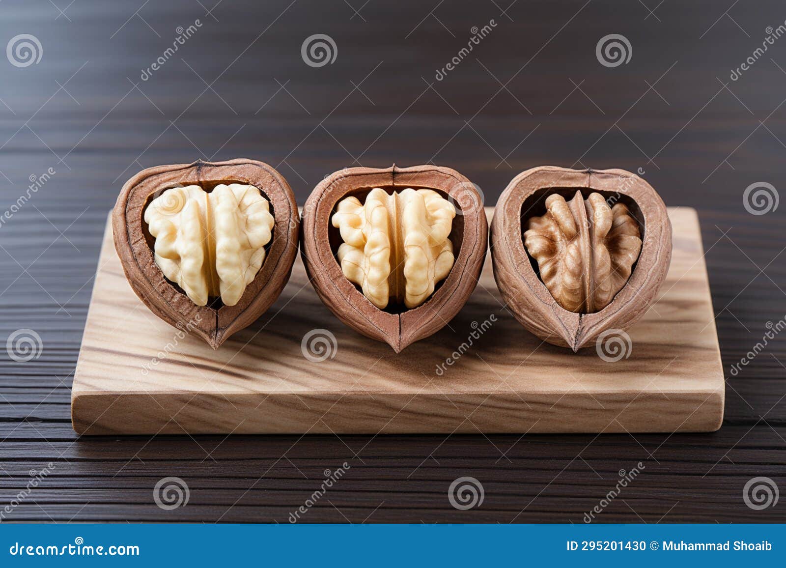 Three Heart Shaped Walnuts in a Perfectly Aligned Row, a Delightful