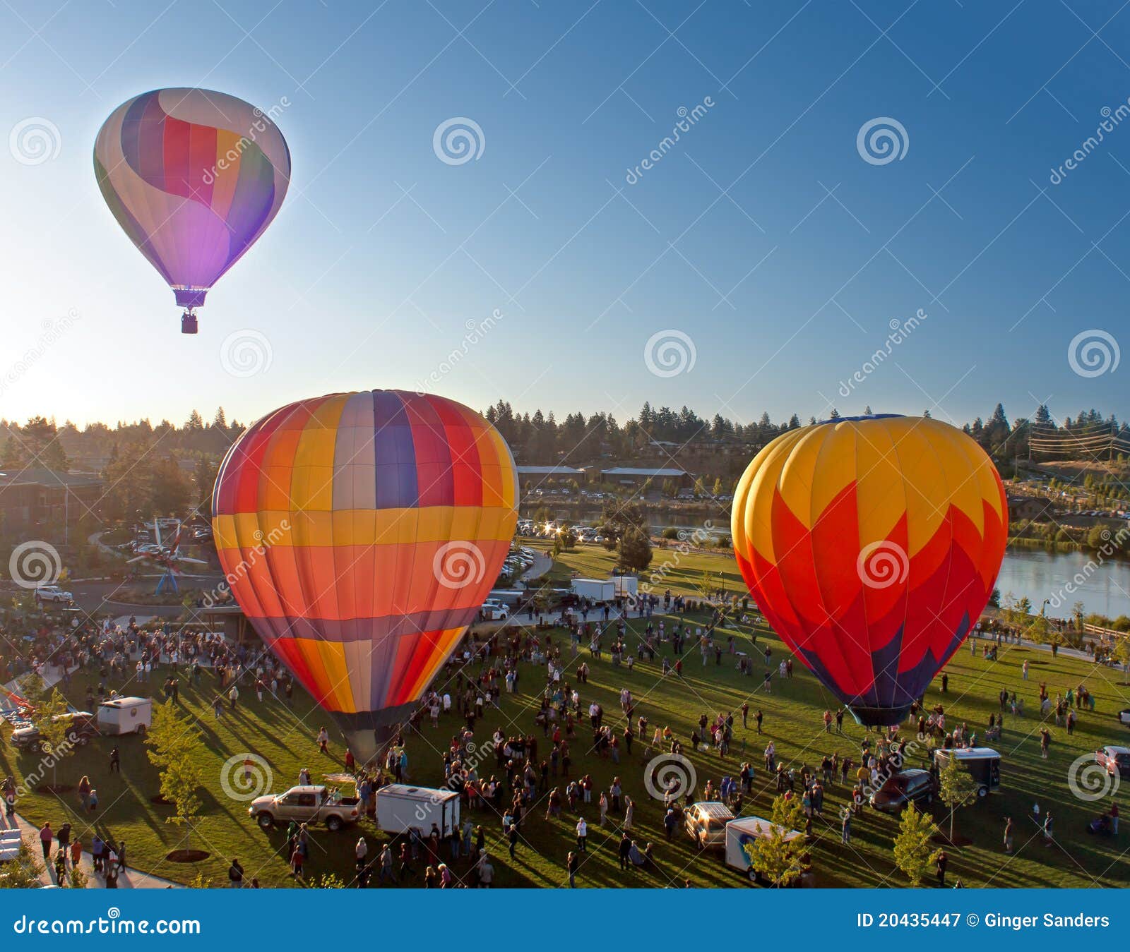 three hot air balloons launching over bend oregon