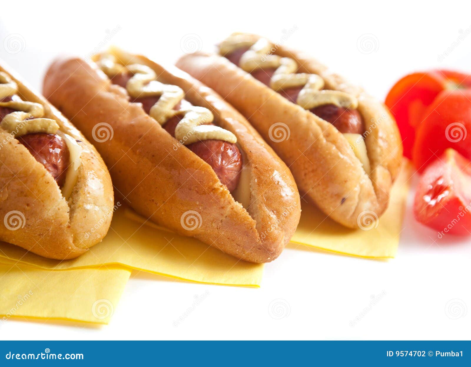 Three hot dogs with tomato stock photo. Image of sausage 9574702