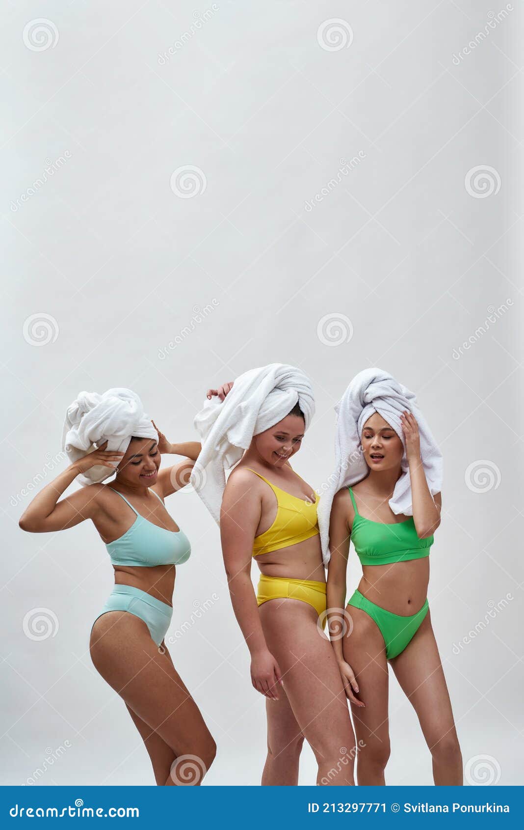 Three Joyful Young Women with Different Body Shapes Wearing