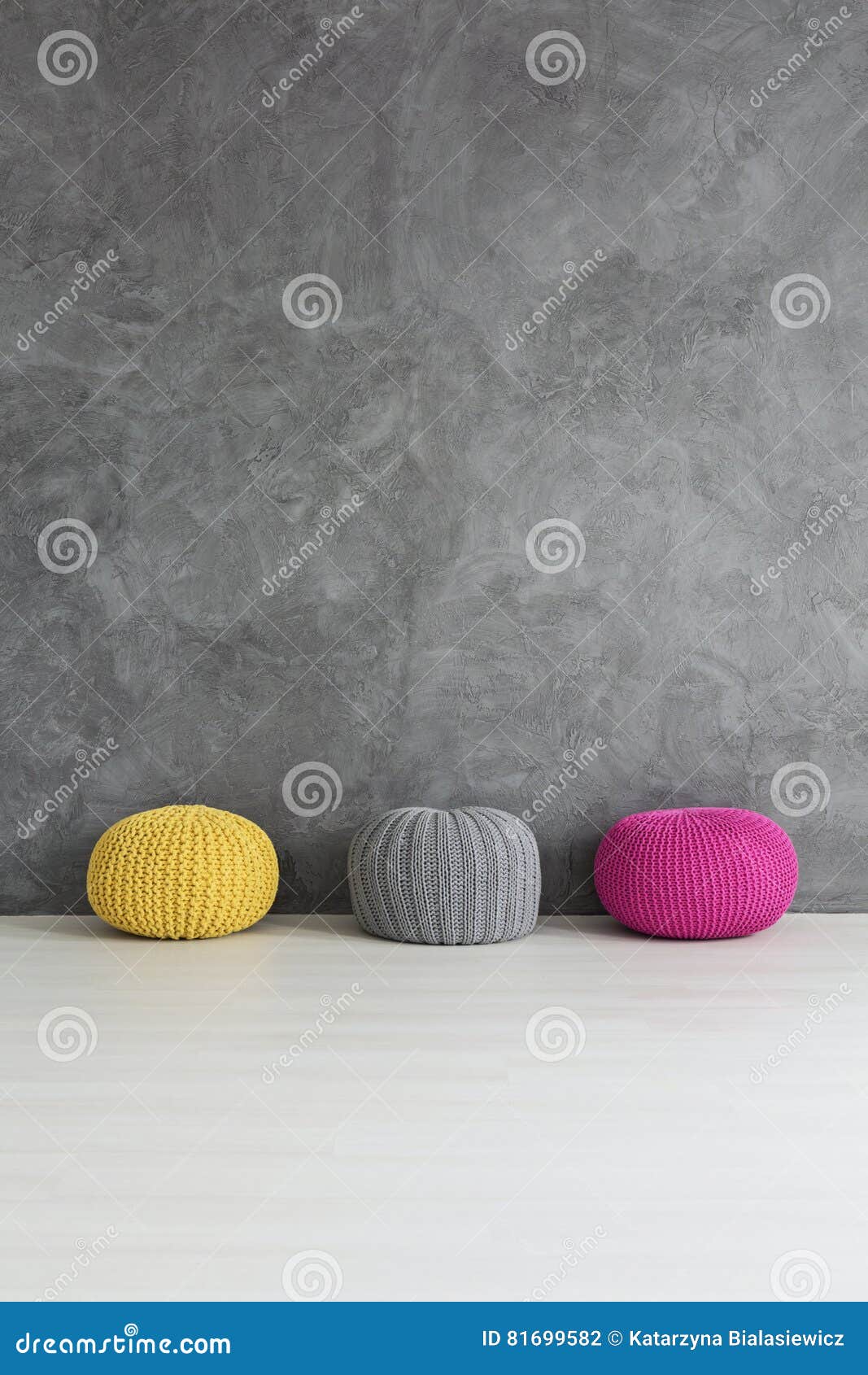 three knitted poufs
