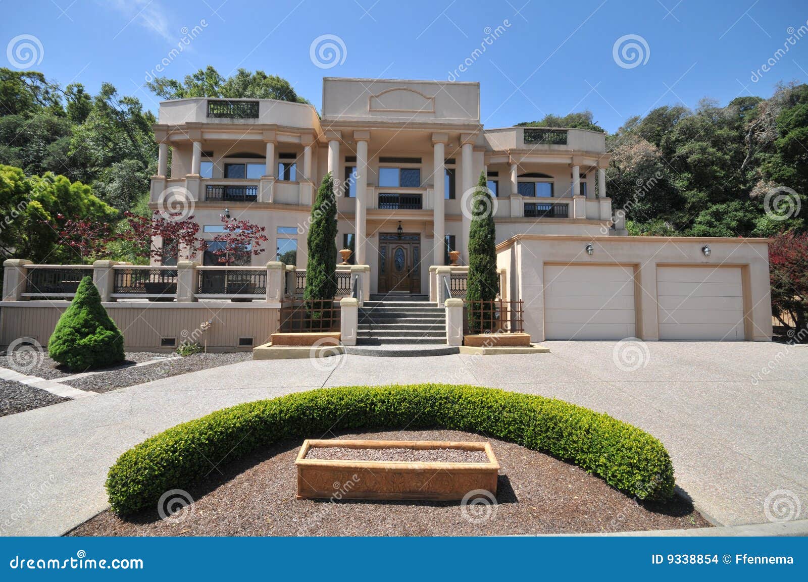 Three Level House With Semi-circle Hedge In Front Stock ...