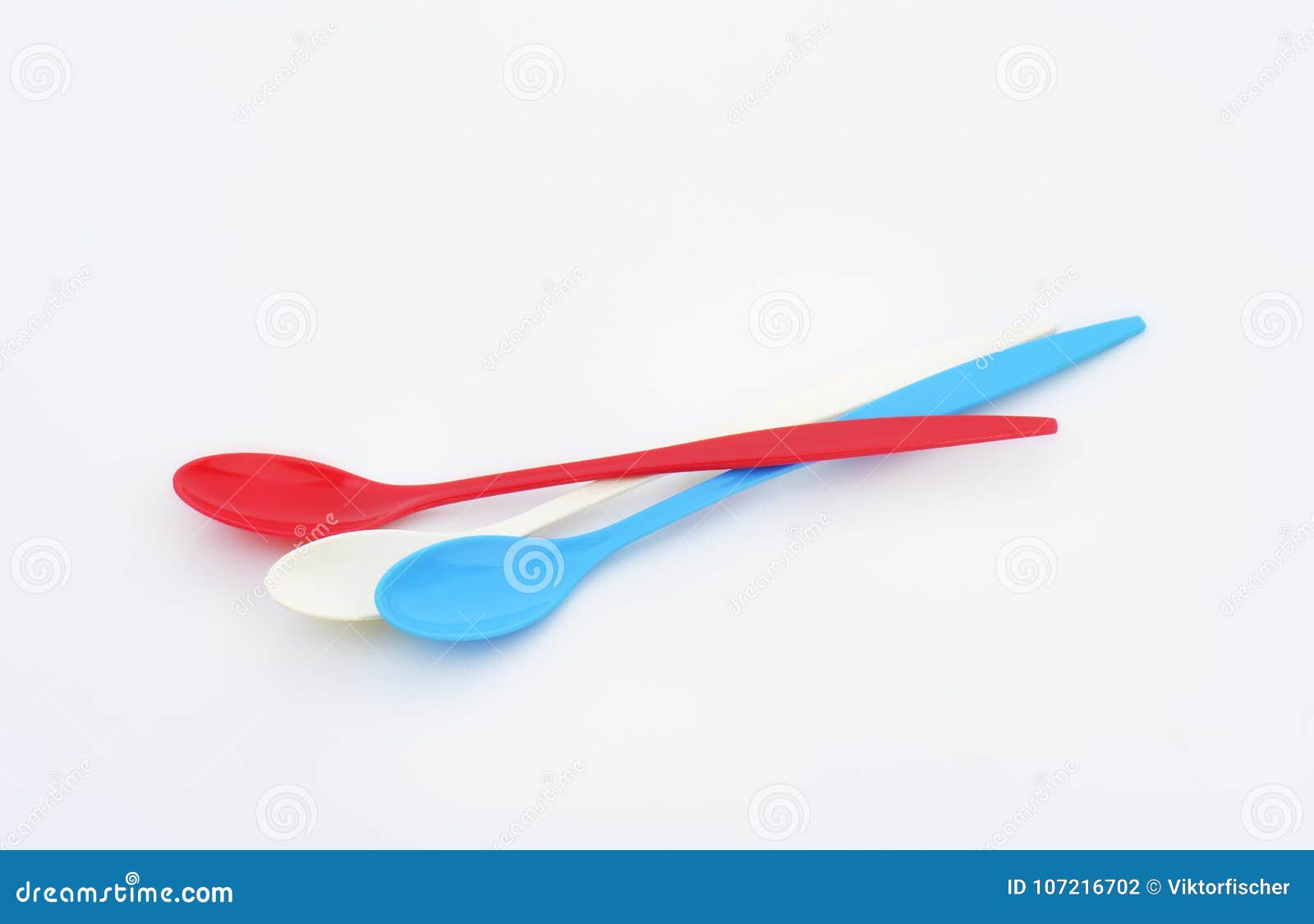 Three long plastic spoons stock photo. Image of cutlery 107216702