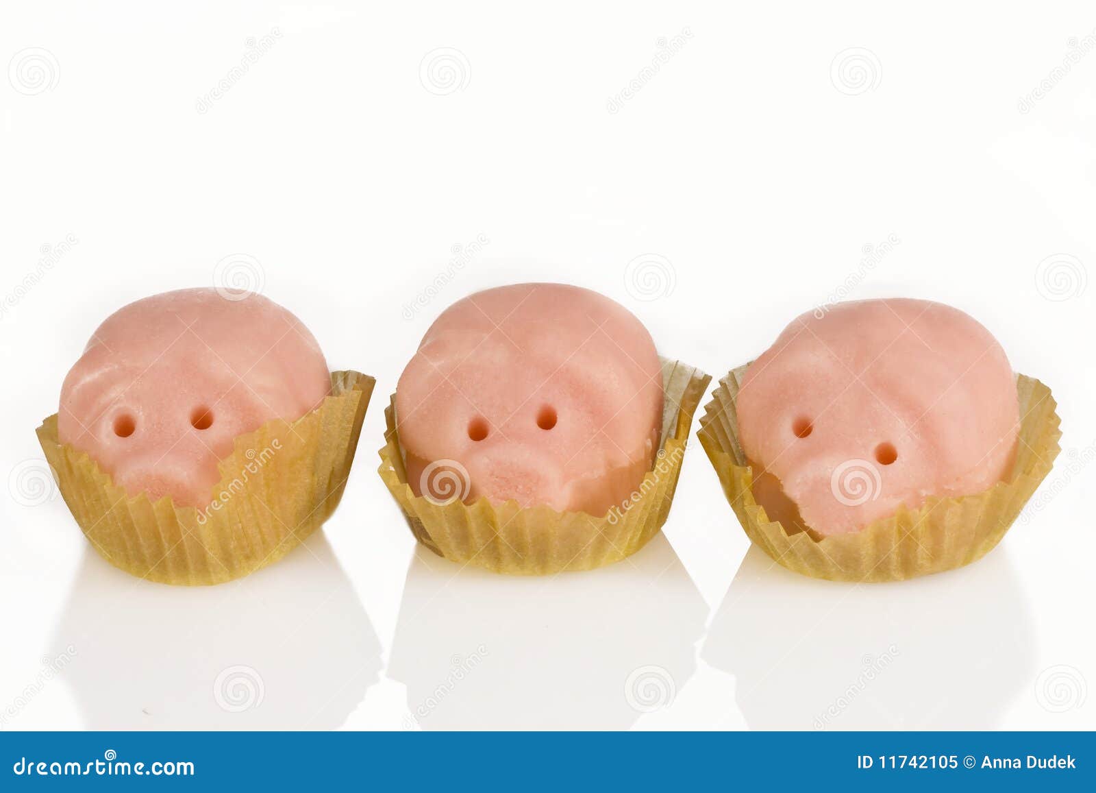 Two Marzipan Pigs With Cloverleaf And Good Luck (in German) Written On