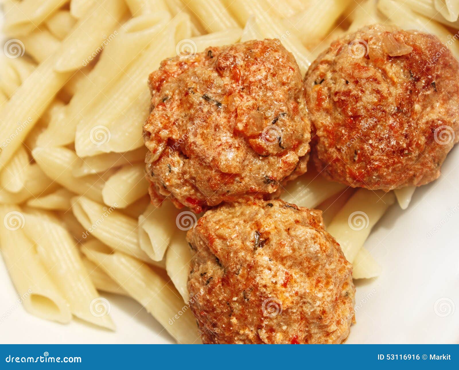 Three Meatballs with Sauce Over Pasta Stock Photo Image of foreground