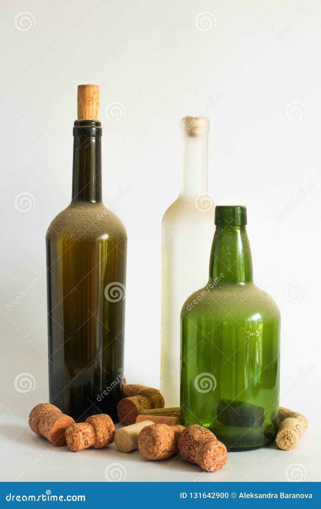 Three Old Dust Wine Bottle and Corks on White Stock Photo Image of