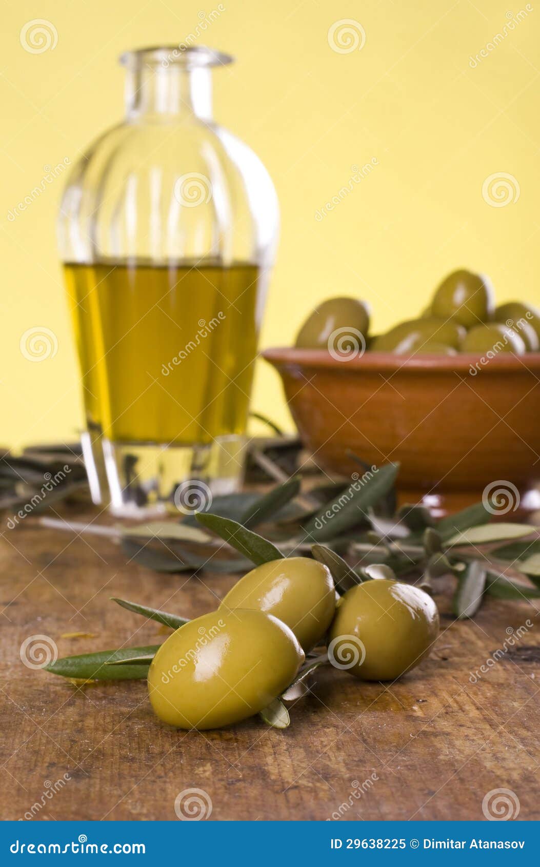 Three Olives with an Olive Oil and Bowl with Olives Stock Image Image