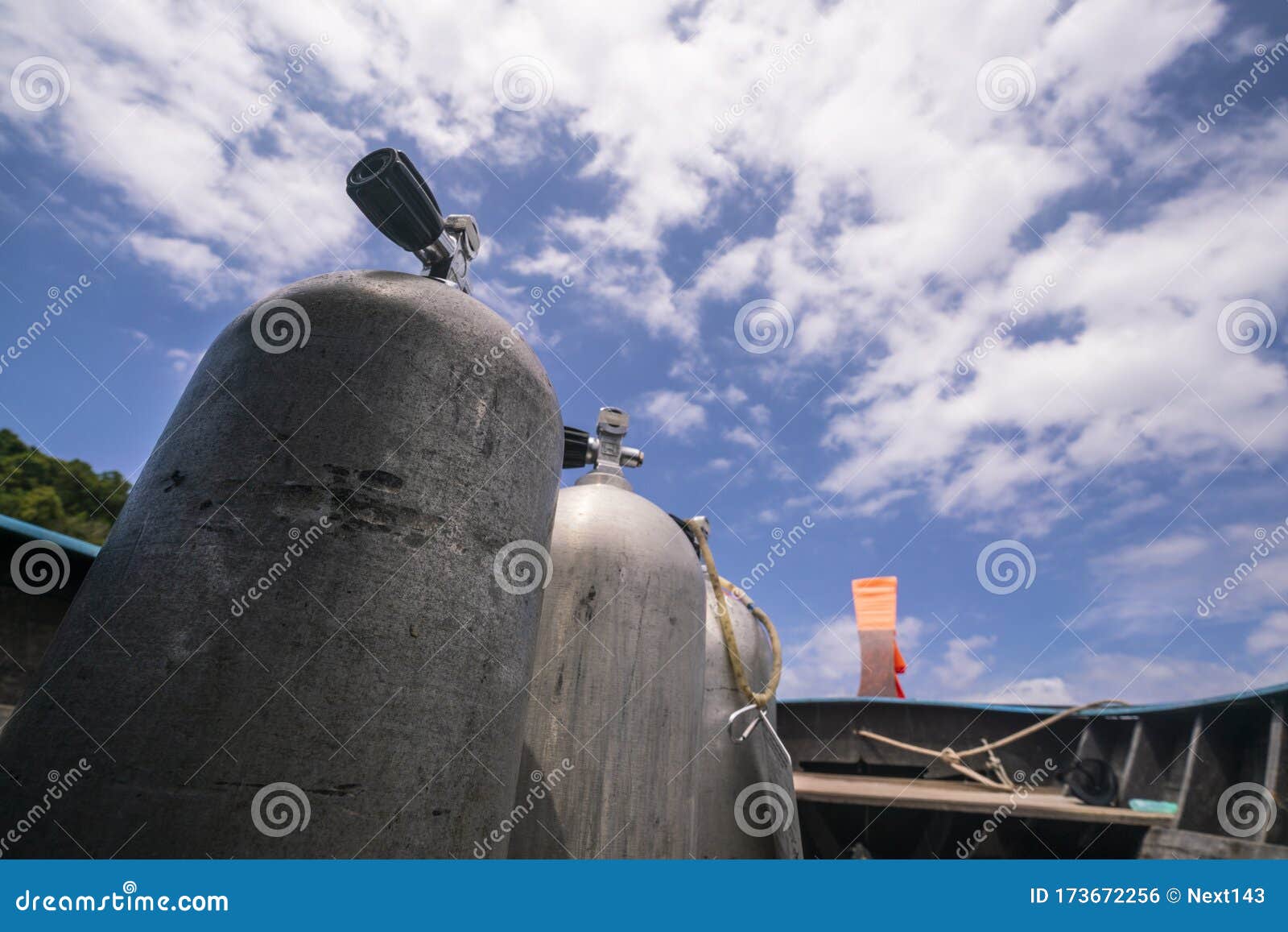 A Three Oxygen Tanks for Scuba Diving with Blue Sky Background Stock