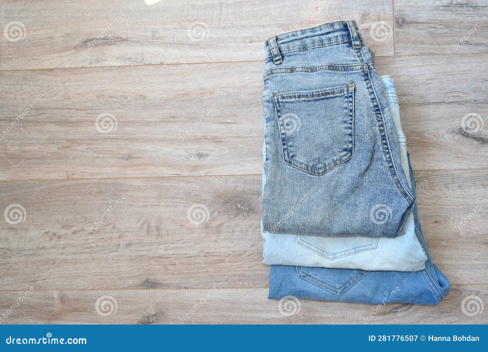 Three Pairs of Jeans Lie on the Floor Stock Image - Image of background ...