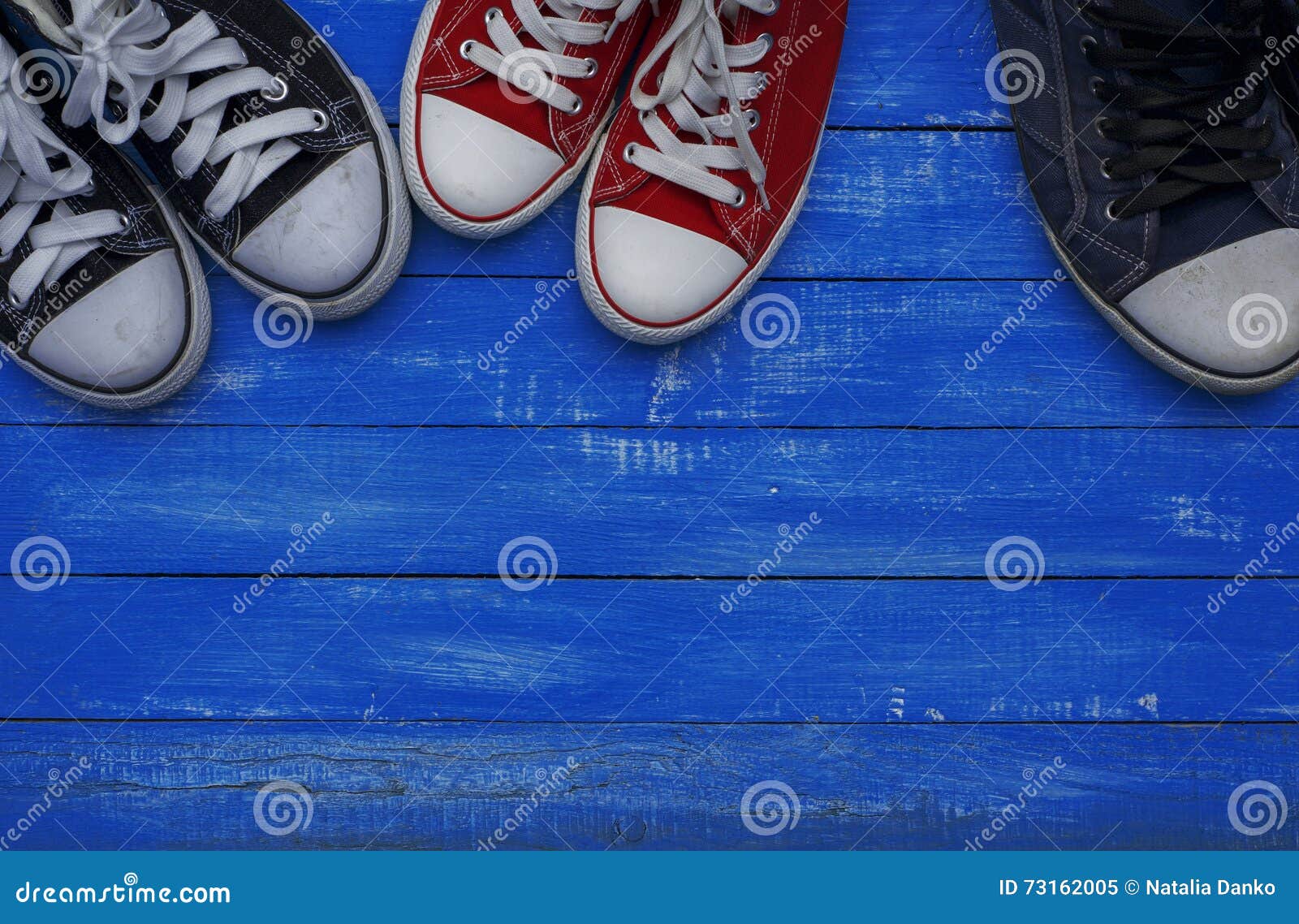 Three Pairs of Sneakers of Different Sizes Stock Image - Image of retro ...