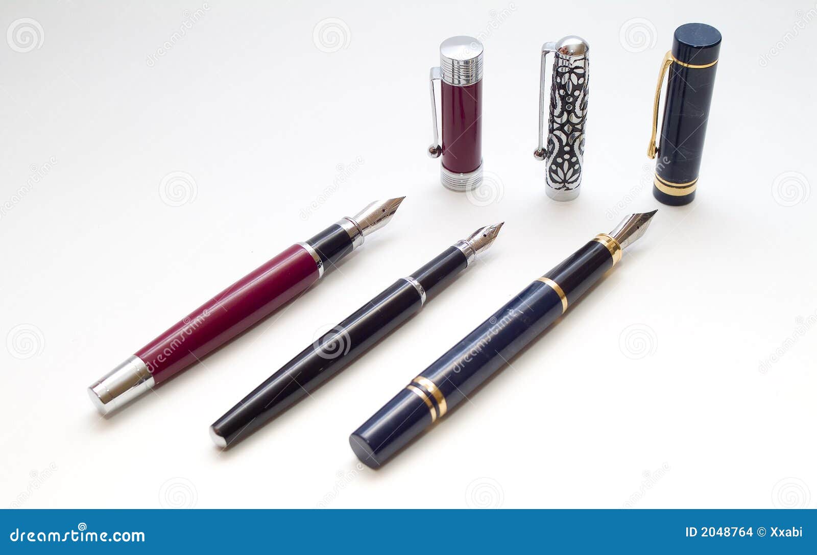 Three pens with caps stock photo. Image of writing, antique 2048764