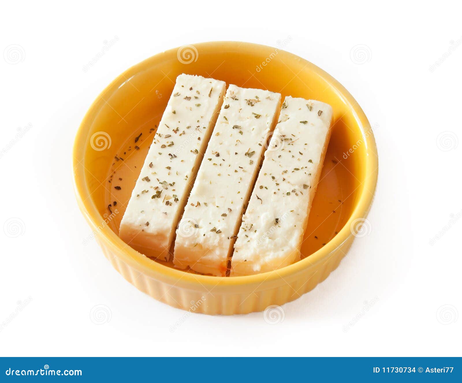 Three Pieces of Feta Cheese on a Yellow Plate. Stock Photo Image of