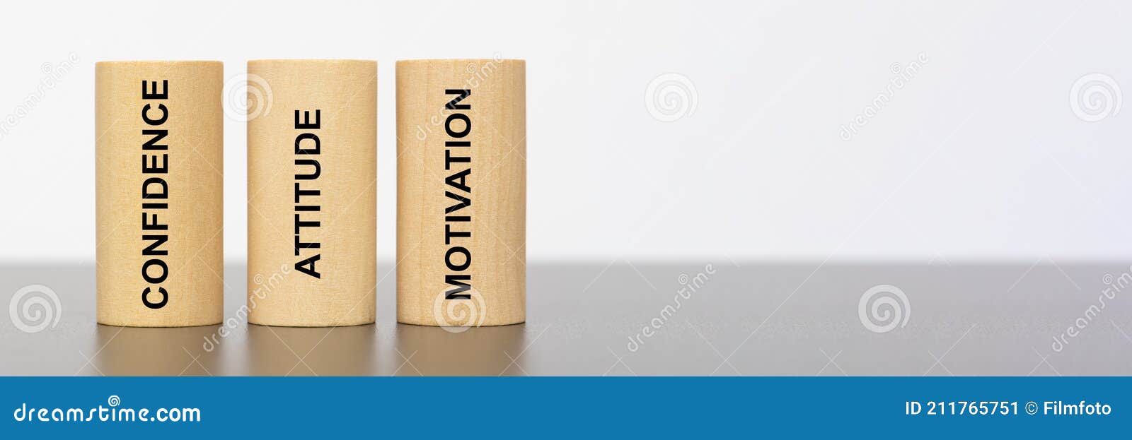Three Pillars Printed with Confidence, Attitude and Motivation Stock
