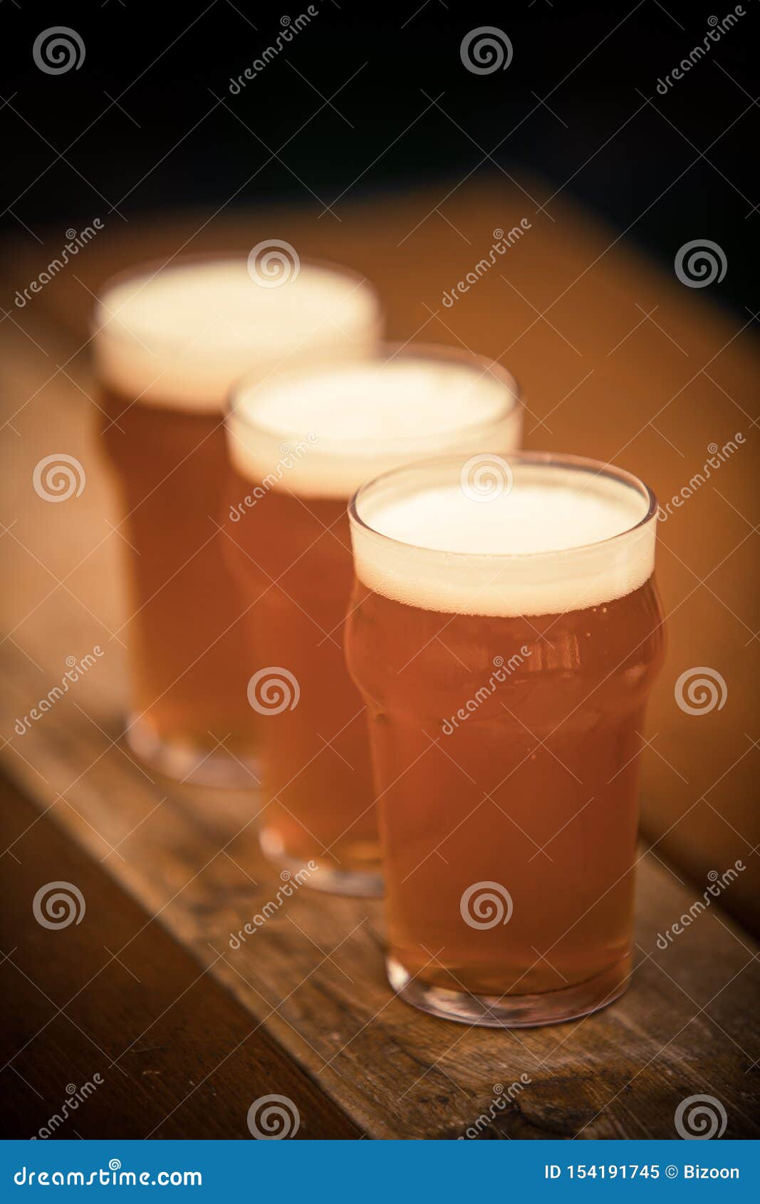 Three Pints Of Beer In A Row Stock Image Image Of Amber Froth 154191745