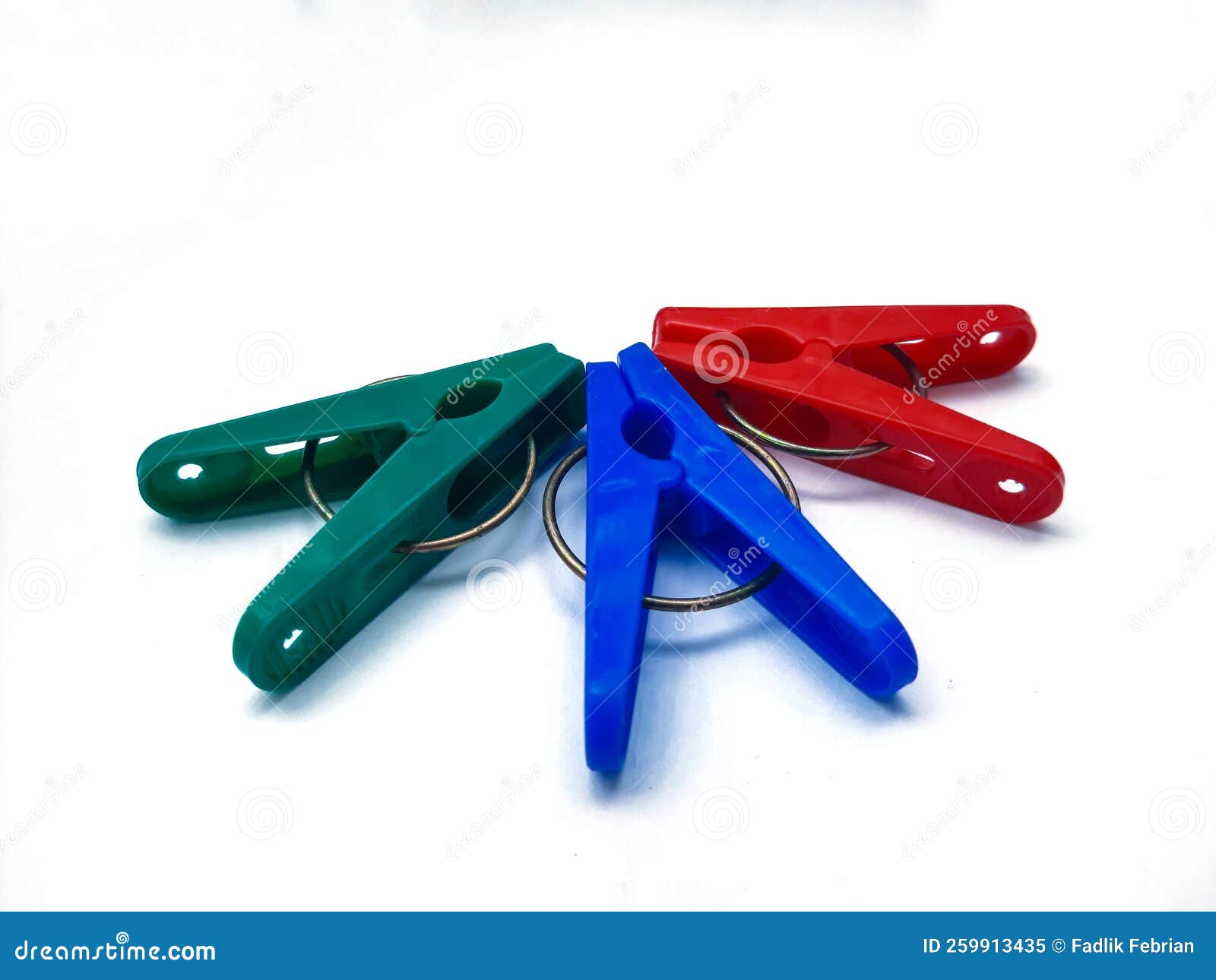 Three Plastic Clothespins stock image. Image of cloth 259913435