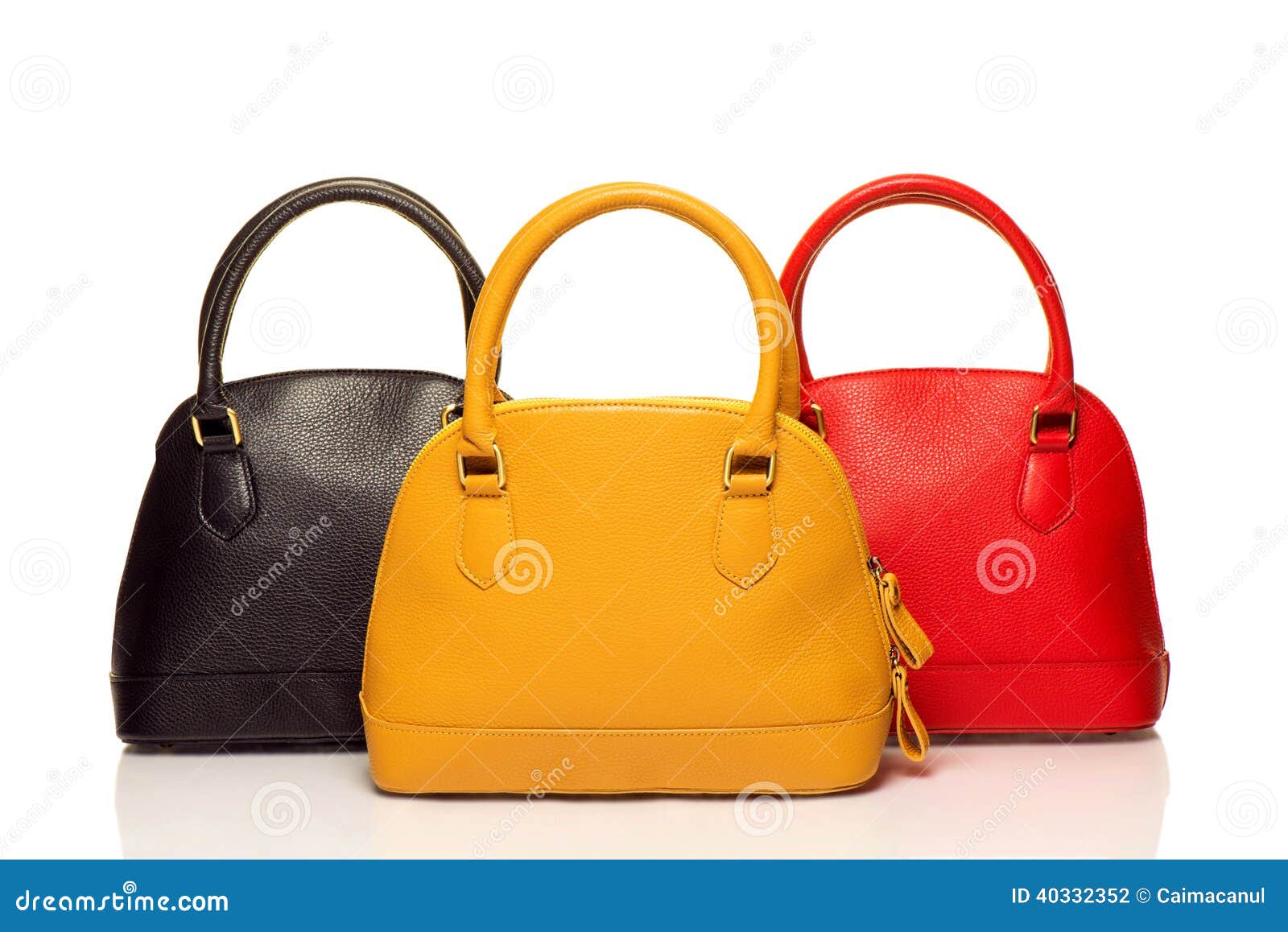 Three purses on white stock photo. Image of leather, background 40332352