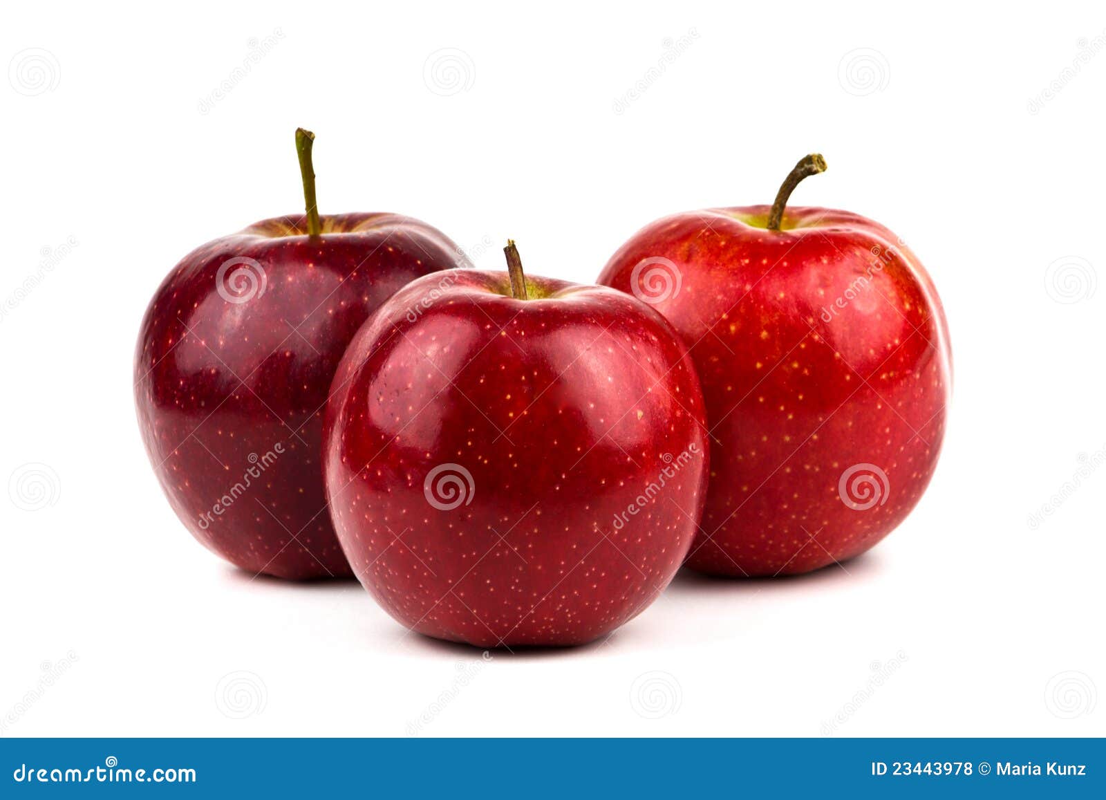 Three red apples isolated on white background.