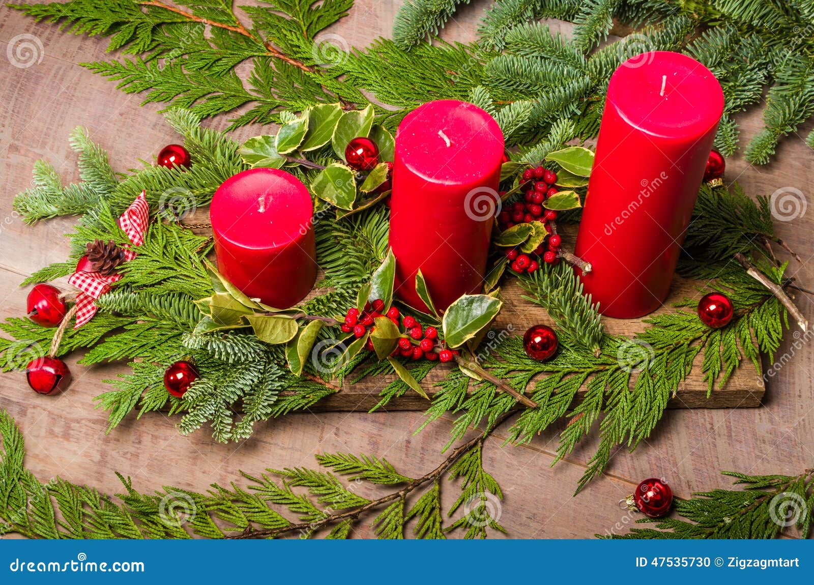 Three Red Candles in a Christmas Arrangement Stock Photo Image of